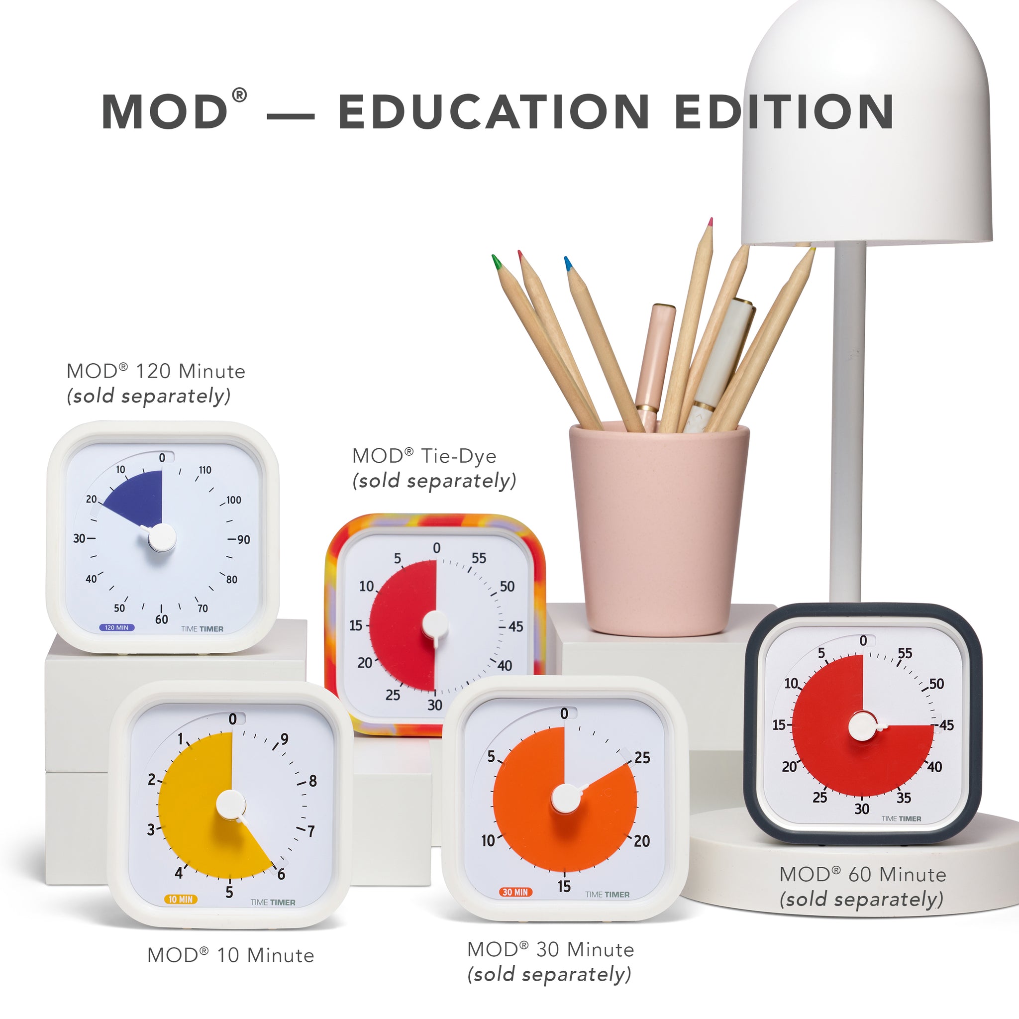 The MOD Education Edition Family is shown as five visual timers. The MOD 60-minute timer with a Charcoal silicone case. The MOD 60-minute timer with a tie-dye case, and the MOD 120-minute timer with a white silicone case and purple disk. The MOD 10 Minute with white exterior and yellow disk. And the MOD 30 Minute with white exterior and orange disk.