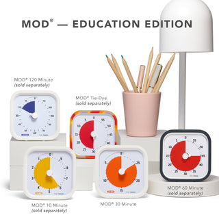 The Time Timer MOD Education Edition family of products is shown. From left to right: MOD 120 Minute is shown with a purple disk, MOD 10 Minute is shown with a yellow disk, MOD Tie-Dye is shown with a red disk and tie-dye case, MOD 30 Minute is shown with orange disk, and finally the MOD 60-minute is shown with a charcoal case and red disk.